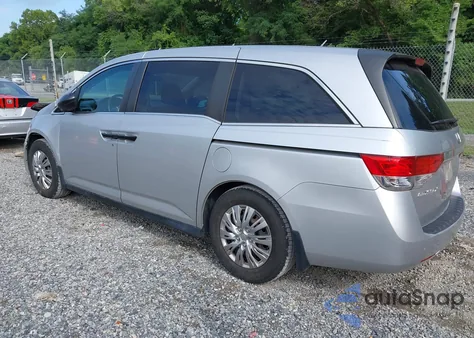 2015 Honda Odyssey Lx z USA, uszkodzony, nr VIN 5FNRL5H2XFB002639
